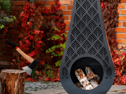 CookKing tuinhaard Ankara sfeerfoto met hout en bijl
