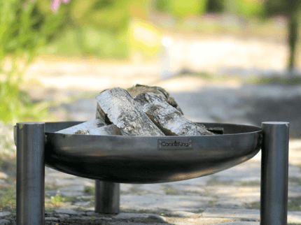 CookKing vuurschaal Palma sfeerfoto met hout
