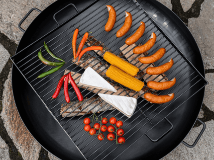 CookKing vierkant stalen grillrooster sfeerfoto met vuurschaal