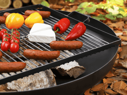 CookKing vierkant stalen grillrooster sfeerfoto met vuurschaal